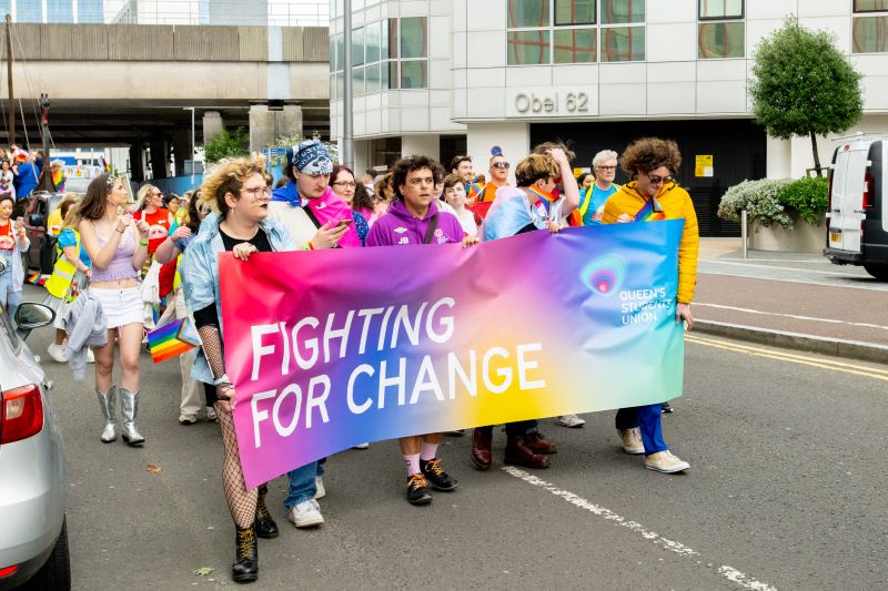 students marching at Belfast Pride Parade